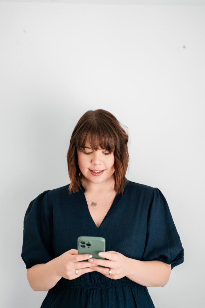 Charlotte on phone portrait